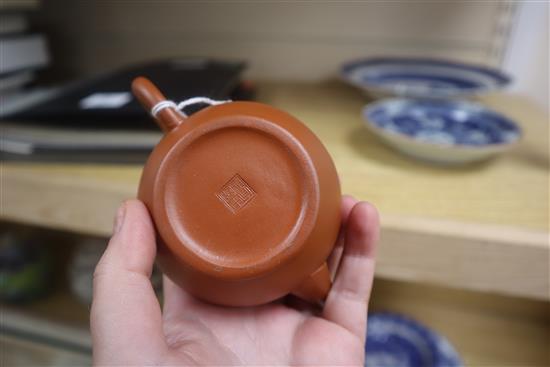 A Chinese Yixing teapot, a Chinese blue and white plate and a Japanese dish (3)